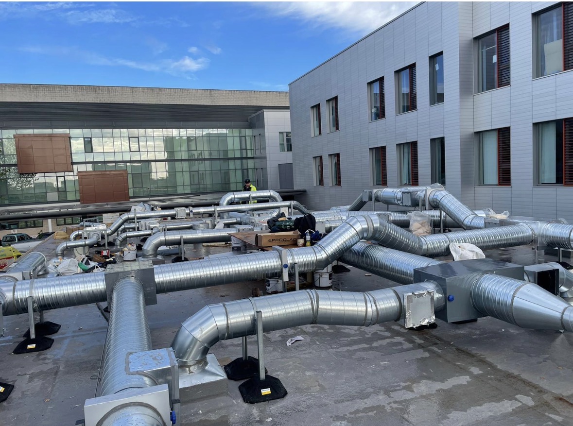 Rooftop industrial ductwork at a UK manufacturing facility