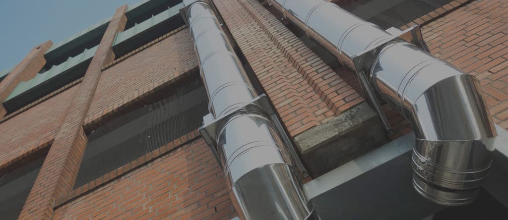 Ventilation Cleaning UK Ductwork on the exterior of a building